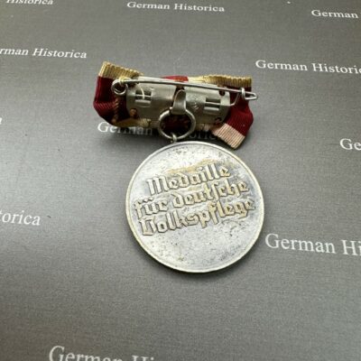 Medaille für Volkspflege an Damenschleife